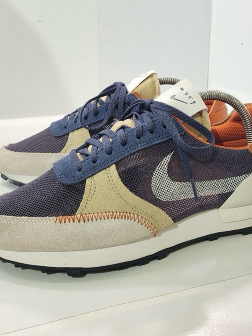 Nike Men’s Sneakers in Navy, Beige and Orange Accents